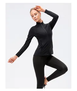 Slim fit black zip-up sports jacket and leggings set showing texture and pocket detail