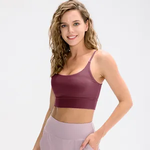 Women's burgundy sports bra and light purple leggings set for yoga and running fitness