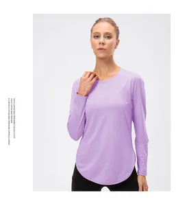 Detail of light purple yoga top with side slit design and breathable fabric texture