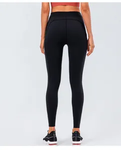 Detail of high-waist yoga leggings showing seamless stitching and butt-lifting design
