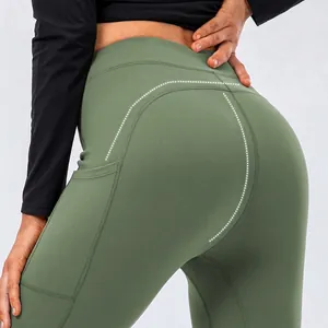 Olive green high-waisted yoga leggings with ergonomic hip-lifting seams and side pockets
