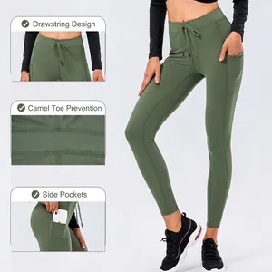 Olive green high-waisted yoga leggings with drawstring waist and side phone pockets