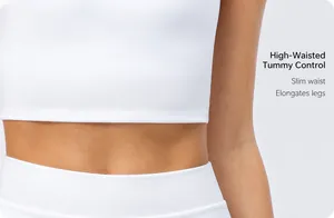 Detail view of white high-waist yoga set focusing on abdominal shaping and premium fabric
