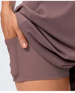 Detailed view of women's skort showing hidden side pocket on inner safety shorts
