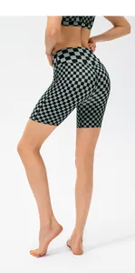 Rear view detail of high-waist checkerboard sports shorts showing fit and texture