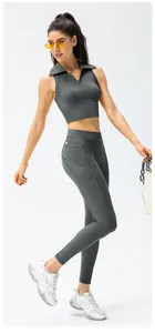 Detailaanzicht van een fitnesslegging met hoge taille en functionele zijzakken