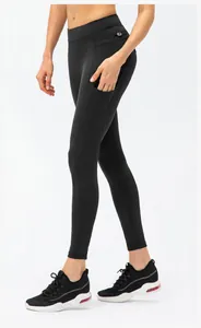 Macro detail of high waisted yoga pants with functional side pockets for gym training