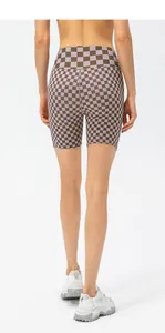 Detailed back view of high-waisted checkered sports shorts showing lifting fit