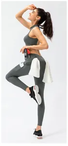 Detail of high waist yoga leggings with side phone pocket and towel holder loop
