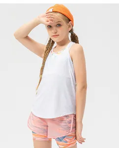 Detail of girls quick-dry white sports vest and colorful geometric print shorts set