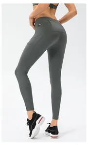 Detail of high waist yoga pants with zipper pocket and side pocket for phone