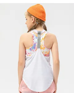 Detail view of girls racerback mesh sports vest over colorful tie-dye underlayer