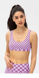 Detail of lavender checkered sports bra with U-neck and professional elastic fabric