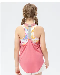 Detail view of pink racerback girls sports vest with inner multi-color dye print fabric