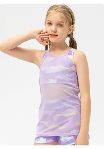 Detail of girls' layered sports top with mesh overlay and lavender camo print pattern