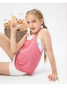 Detail view of pink mesh breathable racerback tank top for girls with colorful dye layers