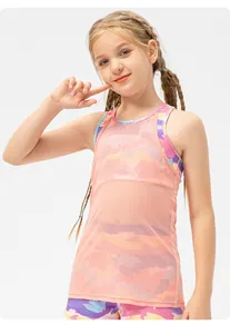 Girls activewear set detail showing pink mesh tank top with colorful camo print shorts