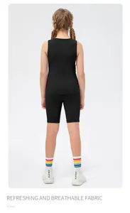Rear view of girl in black high-stretch sports vest and shorts with breathable fabric