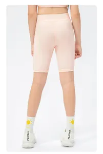 Rear view of pink high-waist kids athletic shorts with elastic quick-dry fabric