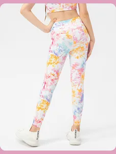 Close-up of high-waisted tie-dye yoga pants and sports bra from a back view