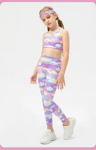Close-up of girls' purple sports set with graffiti print leggings and matching headband