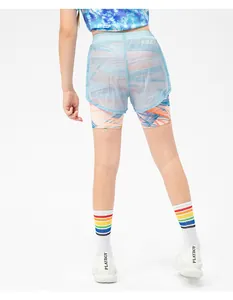 Detail of girls 2-in-1 sports shorts showing blue mesh layer and printed inner lining