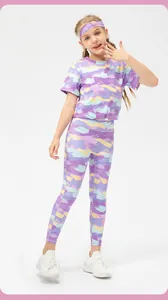 Girl's 3-piece sports set with graffiti print top, leggings and matching headband