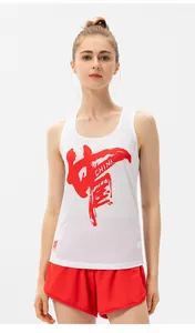 Close-up of white breathable mesh tank top with red China print and athletic shorts