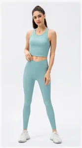 Detail showing the vertical ribbed texture and V-shaped high waist of the light blue yoga set