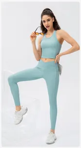 Detail of light blue ribbed yoga set featuring cross waist design and functional side pocket