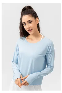 Detail of light blue sun protection shirt showing functional thumb holes on sleeve cuffs
