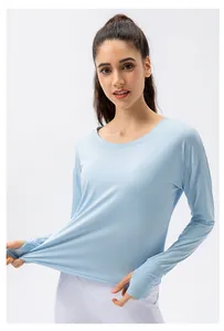 Detail of light blue sun protection shirt showing high elastic fabric and thumb holes
