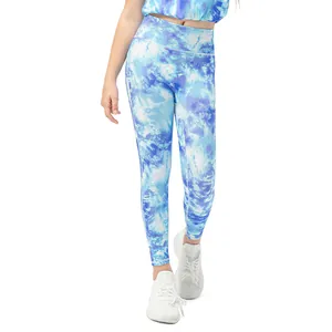 Girls athletic high waist leggings featuring blue and white marble tie-dye print