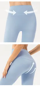 Detail of high-waist yoga leggings with M-shaped butt-lifting line and tummy control waistband
