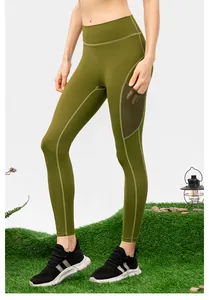 Détail du legging de yoga olive à taille haute avec coutures ergonomiques et poche filet