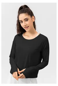 Detail view of black long sleeve sun protection shirt with thumbholes for women