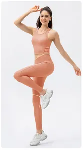 Detail of ribbed texture on high waist yoga pants with crossover waistband design