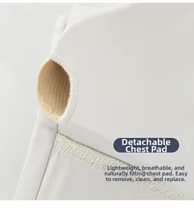 Close-up of white sports bra with breathable mesh and removable padded inserts