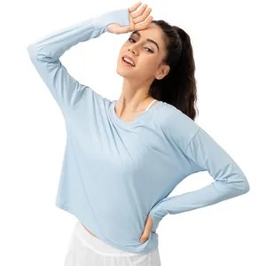 Women's UV protection sports long sleeve top with thumb holes in light blue