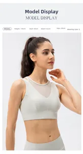 Detail of off-white yoga sports bra featuring sheer mesh paneling for breathability