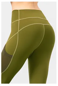 Details der olivgrünen Yoga-Leggings mit Flachnähten und seitlicher Netztasche