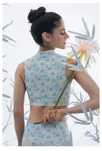 Floral yoga set with high neck crop top and leggings in elegant blue pattern
