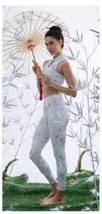 Close-up of floral yoga set featuring traditional mandarin collar and frog button detail