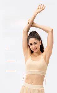 Detail view of sports bra with thin straps and mesh stitching for breathability