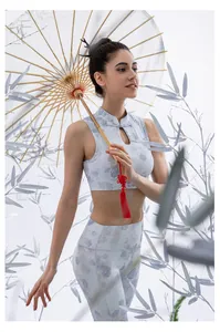 Detail of blue floral yoga set featuring Mandarin collar with cut-out back and high waist leggings