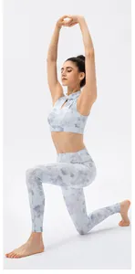 Detail of floral yoga set featuring mandarin collar vest and high-waist printed leggings