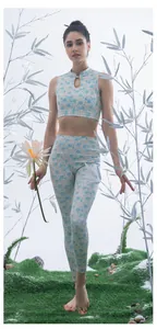 Detail of vintage floral yoga set featuring mandarin collar and traditional knot button