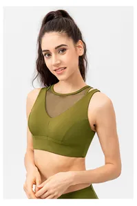Detail view of olive green sports bra featuring breathable mesh splicing and stretchy fabric