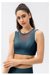 Macro detail of breathable mesh paneling on a dark teal high-elastic sports bra