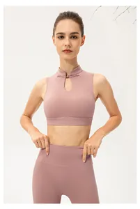 Detail of mauve yoga set with mandarin collar cutout top and high waist leggings